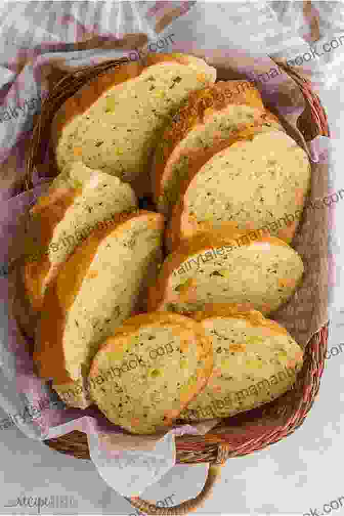 A Golden Brown Loaf Of Garlic Bread, Topped With A Generous Layer Of Garlic Butter. The Professional Bread Machine Cookbook For Beginner: Easy Bread Recipes For No Fuss Home Baking With Your Bread Maker