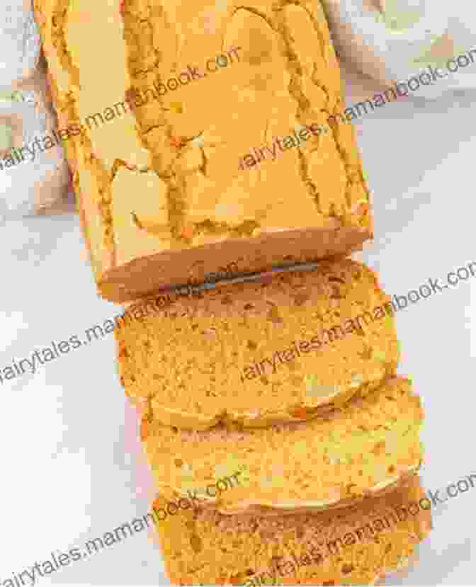 A Loaf Of Sweet Potato Bread, With A Golden Orange Color And A Soft, Slightly Sweet Crumb. The Professional Bread Machine Cookbook For Beginner: Easy Bread Recipes For No Fuss Home Baking With Your Bread Maker