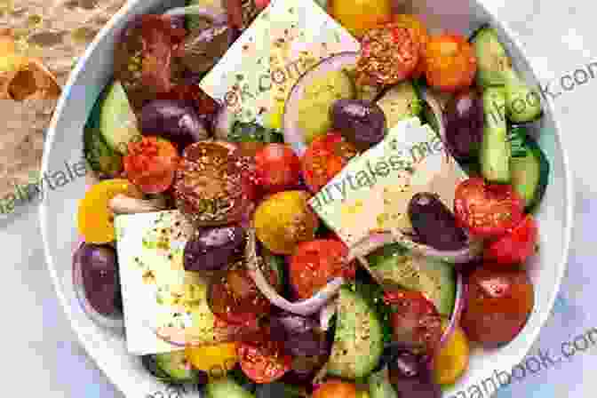 A Vibrant Greek Salad, Featuring Fresh Tomatoes, Cucumbers, Feta Cheese, Onions, And Olives, Drizzled With Olive Oil And Oregano. Unbelievable Pictures And Facts About Greece